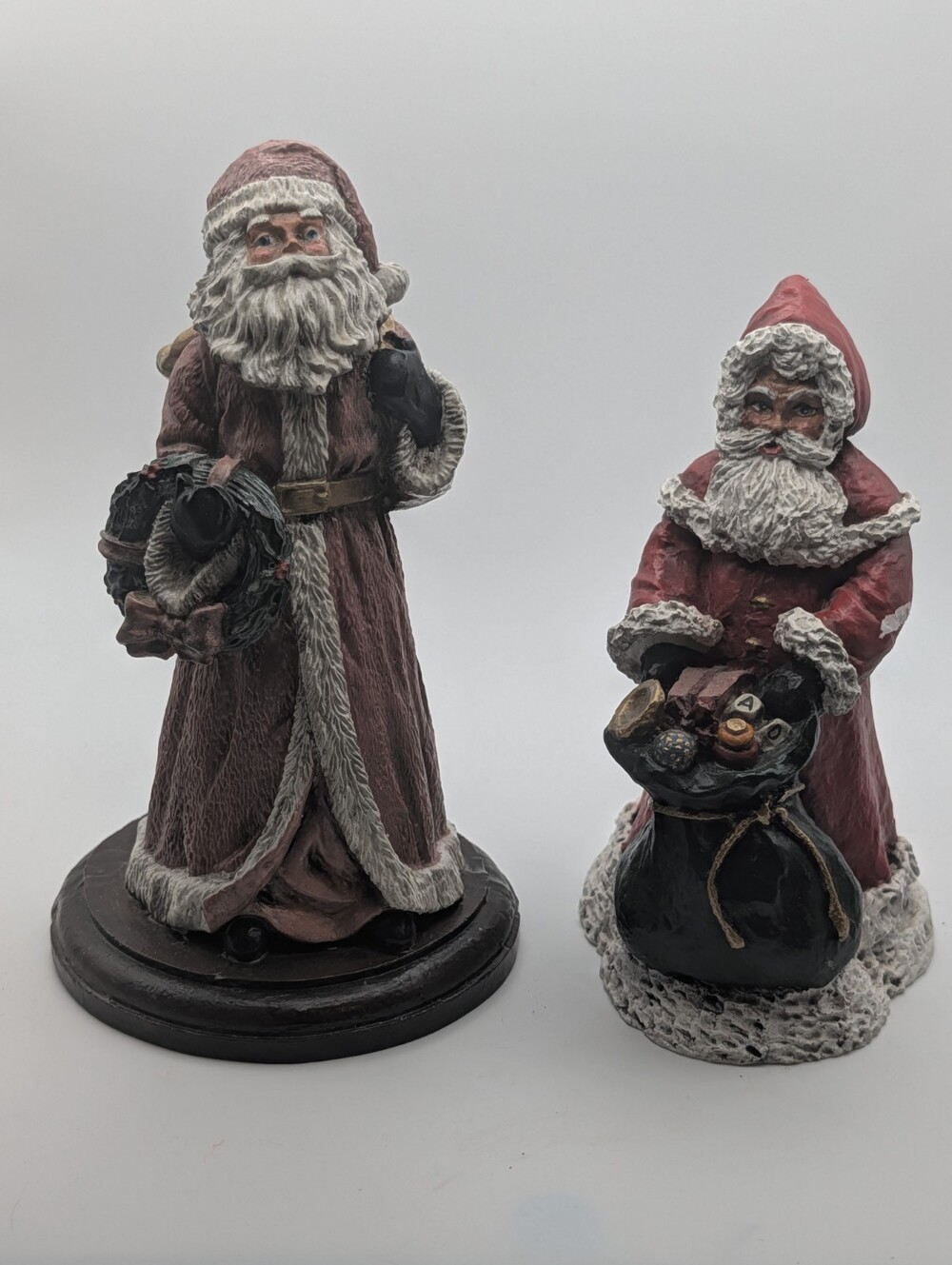 2 Beautifully Hand Painted Resin Vintage Santa Claus Figurines